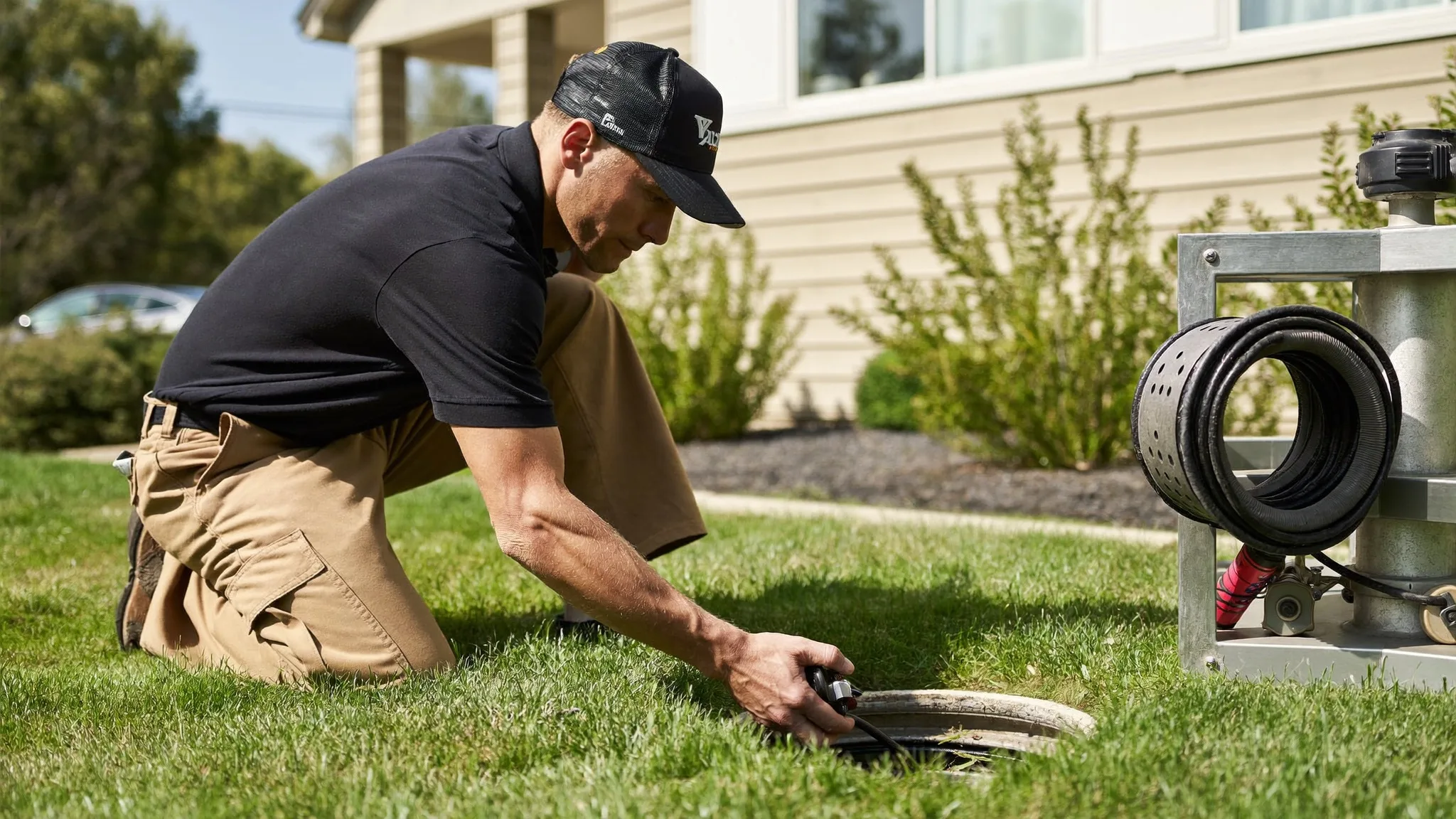 Sunny Home Services plumber running a sewer camera inspection along the Wasatch Front